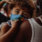 Global deaths due to COVID-19 have fallen by 95% since January, and nations need to take steps to manage virus variants alongside other infectious diseases, the WHO director-general said.