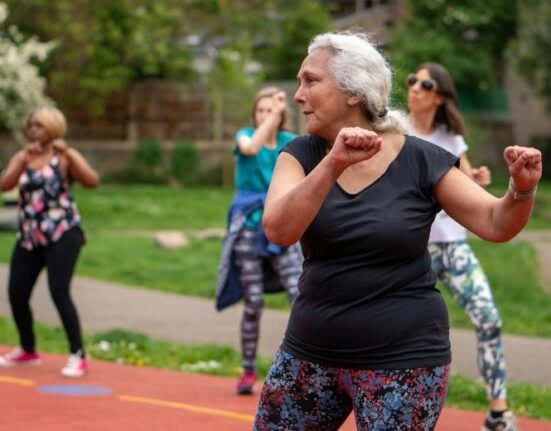 women exercising in a group for elderly