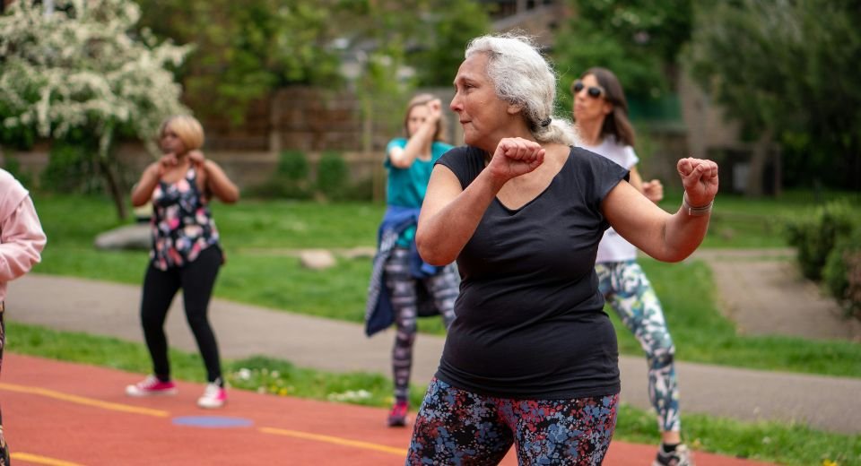 women exercising in a group for elderly