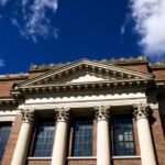Harvard University has amended its lawsuit against the US administration by saying that its researchers would lose another $450 million in grants from several agencies.