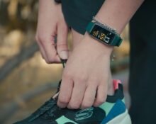 Person walking outdoors wearing fitness tracker while on GLP-1 weight loss medication